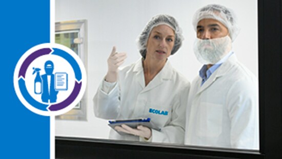 Two cleanroom technicians