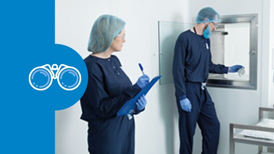 Two technicians in a cleanroom