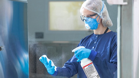 Sterile Isopropyl Alcohol Spraying in a Cleanroom 