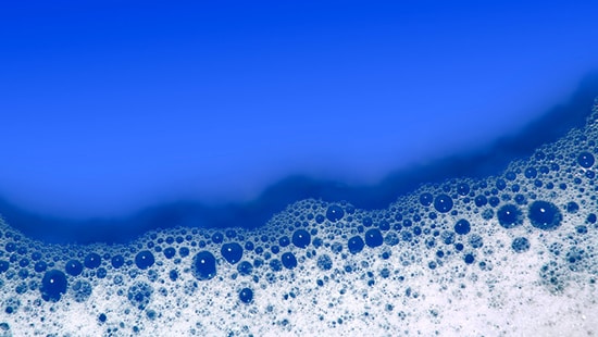 White Foam on Blue Background