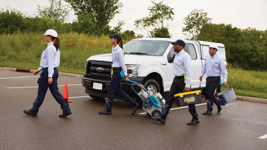 Pest control associates on their way to serve a customer